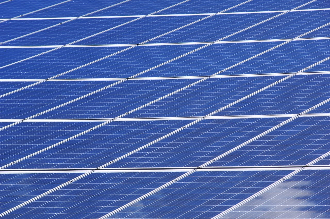 get-in-touch Close-up view of solar panels outdoors capturing renewable energy efficiently.